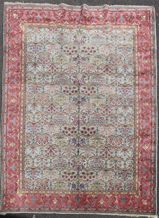 A Kirman carpet, 11ft 3in by 8ft.